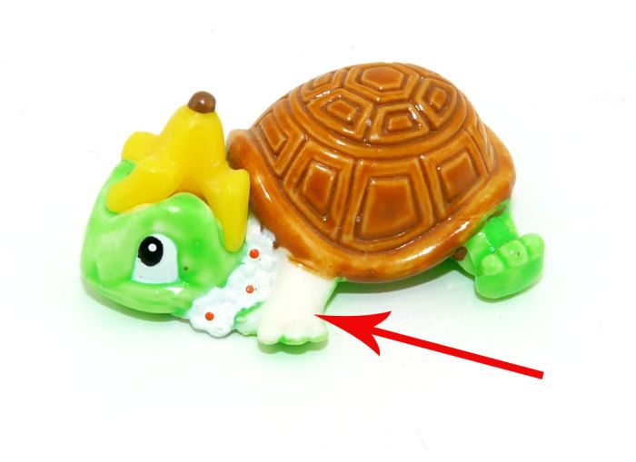 EU Tölpi in hellgrün, wo der Fuß nicht mit bemalt wurde