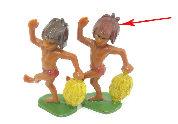 Mogli mit Bananenstaude wo die Haare hellbraun bemalt sind (Ü-Ei Farbvariante)
