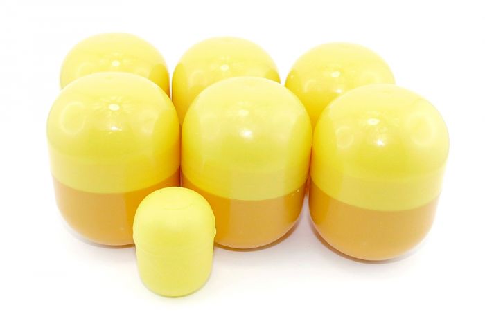6 leere Mini Maxi Ei Kapseln in gelb-orange [Maße der Kapsel: Länge  85mm - Durchmesser 60mm]