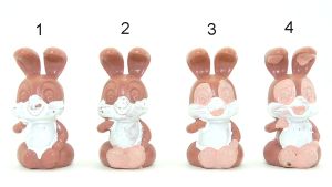 4x Hase Puuh sitzend in fortlaufenden Produktionsbemalungsschritten