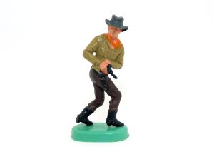 Cowboy auf Bodenplatte 1975, Cowboy mit Colt