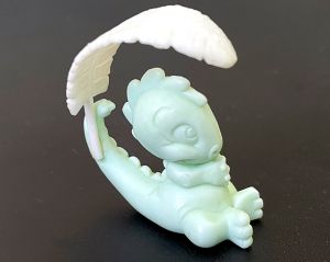 Rohling von Drolli Dinos 1993 mit weißem Palmwedel (Ü-Ei Rohling)
