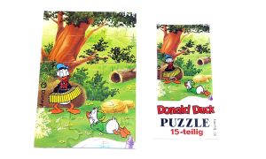 Puzzleecke oben links mit Beipackzettel von Donald Duck Familie