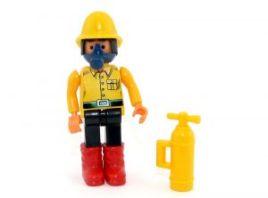 Feuerwehrmann mit Feuerlöscher in gelb. Haare in schwarz (Ü-Ei Steckfigur)