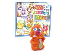 Filzi Dog mit orange Halsband und Beipackzettel (Schreibtischbande 2004)