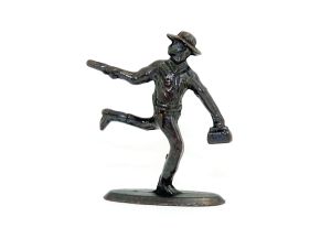 Cowboy mit Revolver und kleiner Tasche auf der Flucht, brüniert von 1977 aus dem Überraschungsei (Metallfiguren)