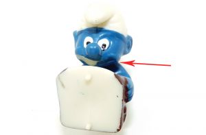 Schokokuss (Negerkuss) -Schlumpf, wo der Mund zur Hälfte blau bemalt ist (Variante)