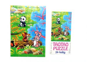 Tao Tao Puzzle unten rechts mit einem Beipackzettel "Ü-Ei Rarität" (24 Teile Puzzle)