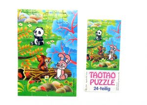 Tao Tao Puzzle unten rechts mit einem Beipackzettel "Ü-Ei Rarität" (24 Teile Puzzle)