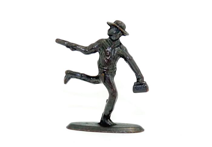 Cowboy mit Revolver und kleiner Tasche auf der Flucht, brüniert von 1977 aus dem Überraschungsei (Metallfiguren)